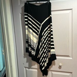 Spense black and beige with asymmetrical skirt.